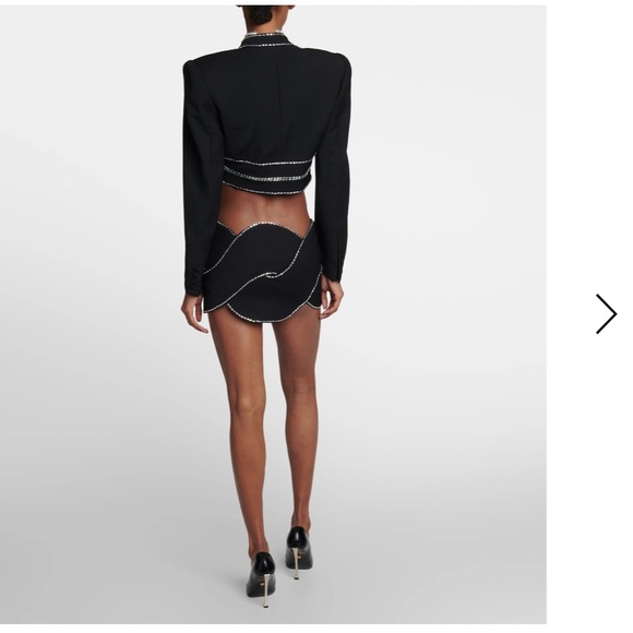 Area
Embellished wool rope mini skirt- NWT- size 8 - Picture 15 of 16